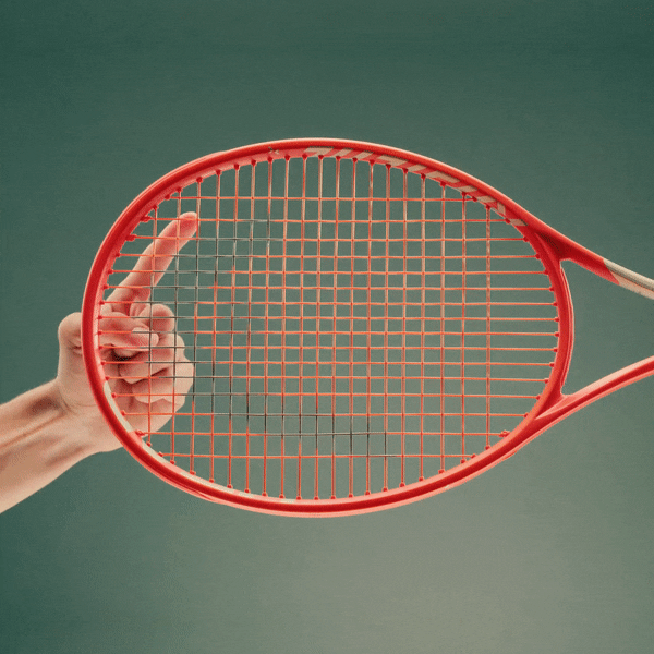 Radical Racquet with hand to explain sound grommet