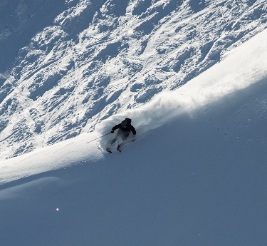 Skier on a  snowy mountain